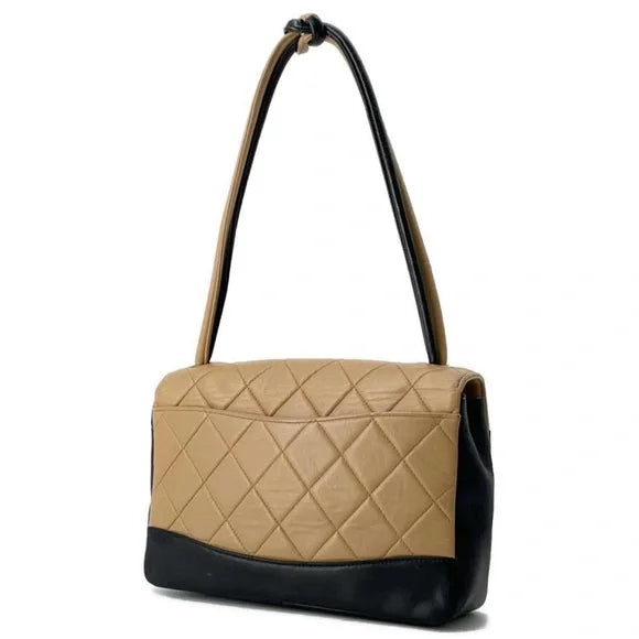 CHANEL Matelassé Tie Knot Bicolor Lambskin Bag in Black and Camel