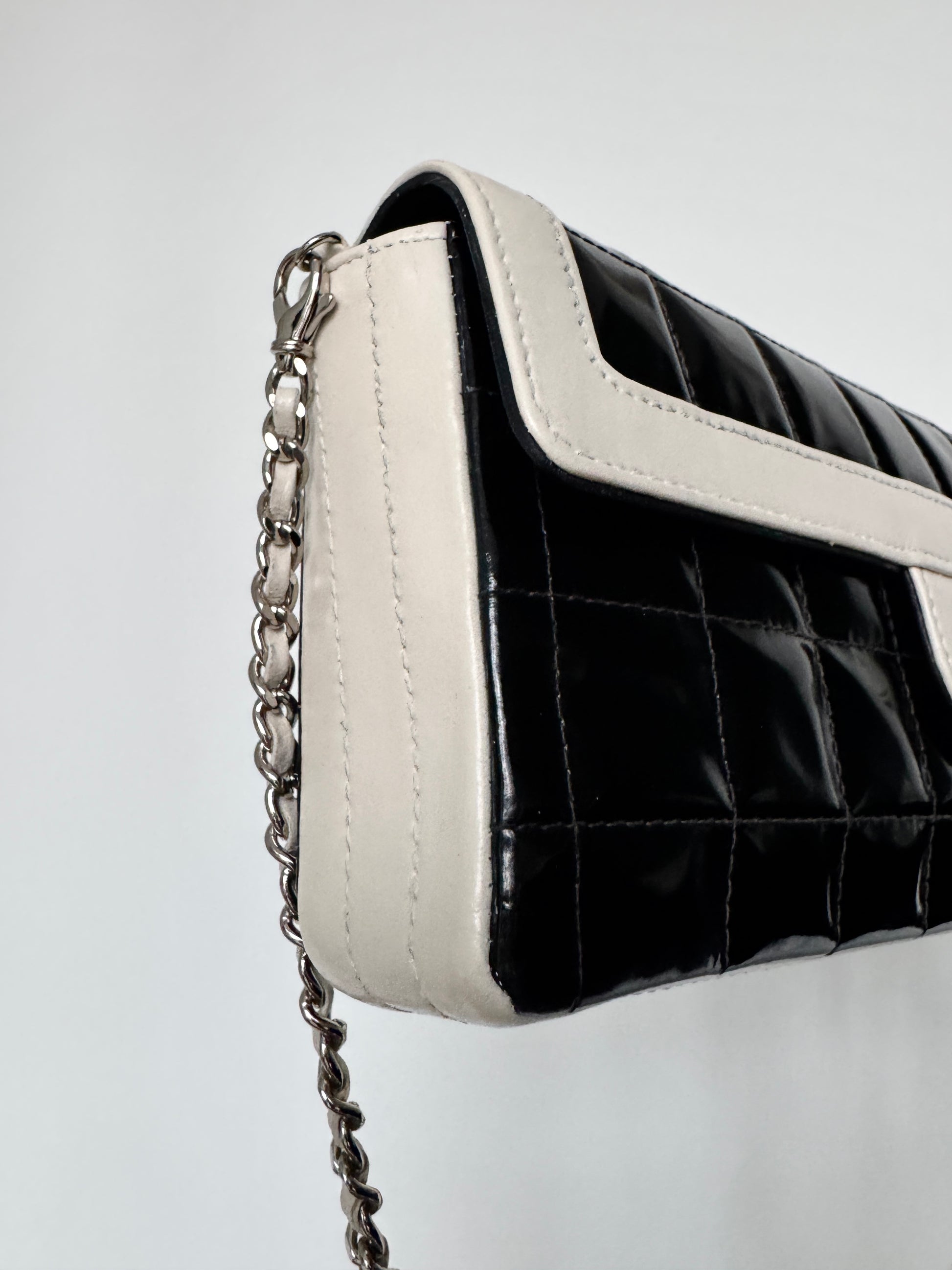 CHANEL East West Chocolate Bar Patent Leather Bag in Black and White