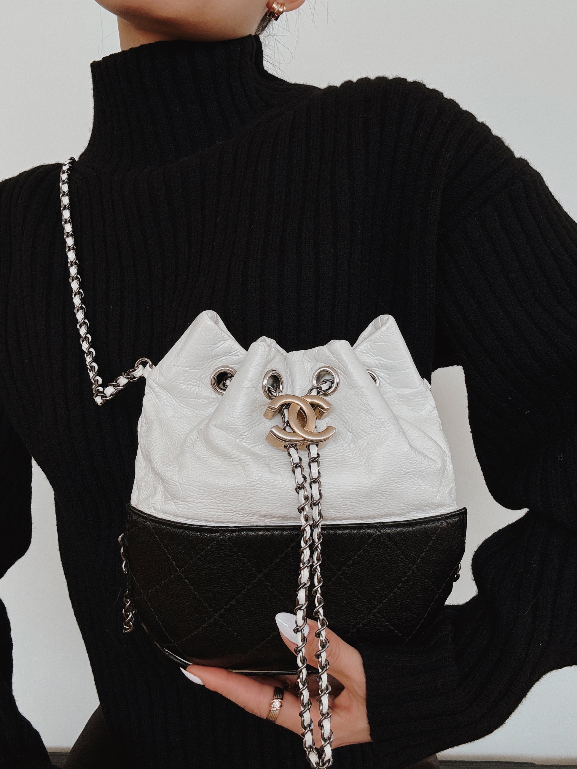CHANEL Aged Calfskin Quilted Gabrielle Bucket Bag - White & Black