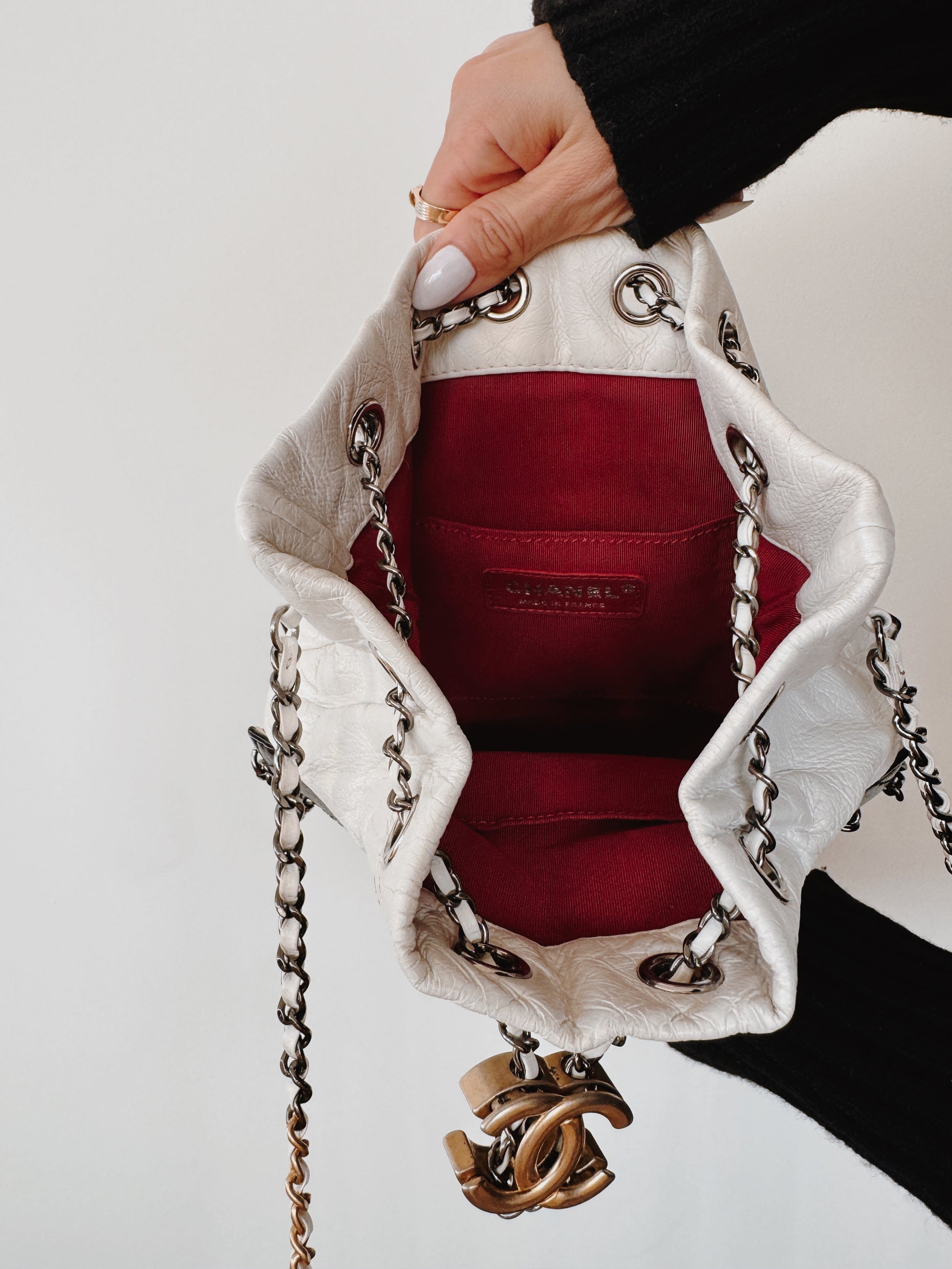 CHANEL Aged Calfskin Quilted Gabrielle Bucket Bag - White & Black