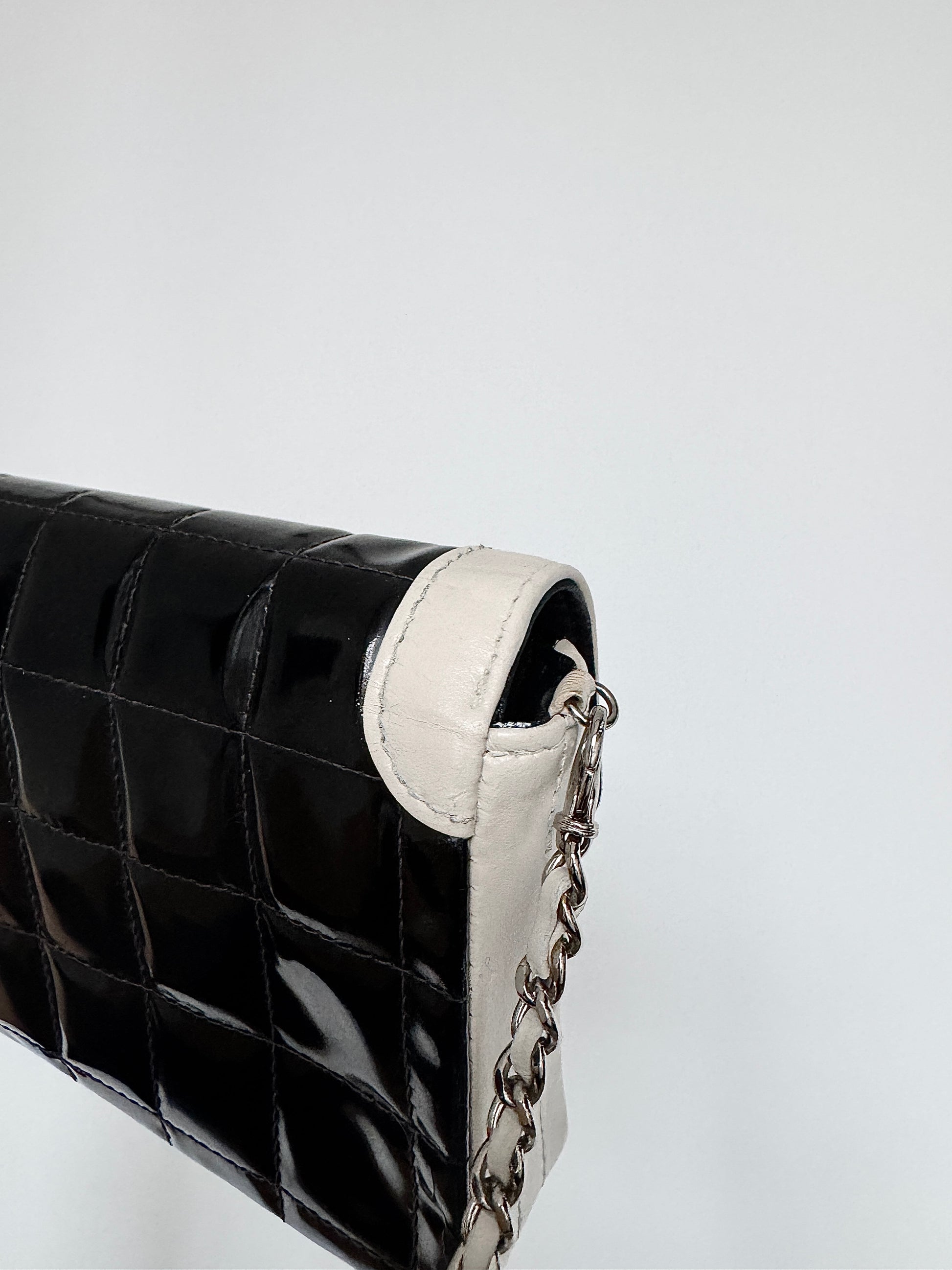 CHANEL East West Chocolate Bar Patent Leather Bag in Black and White