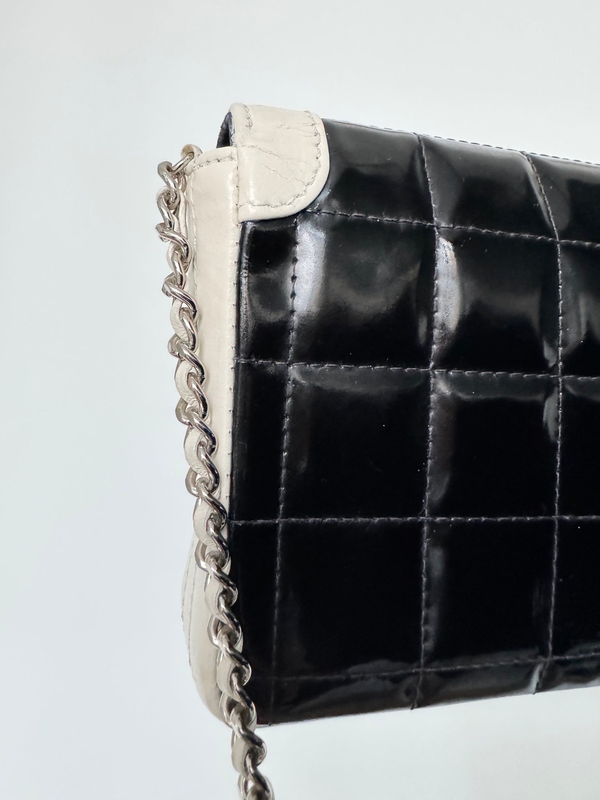CHANEL East West Chocolate Bar Patent Leather Bag in Black and White